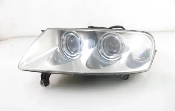 Volkswagen Touareg I Headlight/headlamp 7L6941015BK