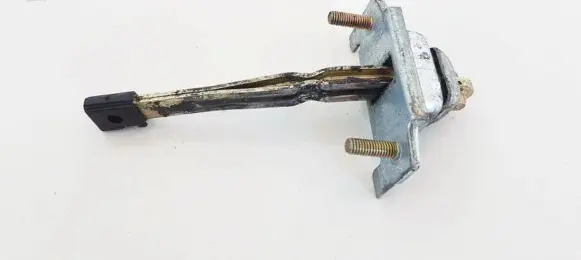 Mazda 323 Rear door check strap stopper