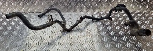 Volkswagen PASSAT B4 Engine coolant pipe/hose 037121065