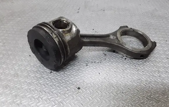 Piston with connecting rod