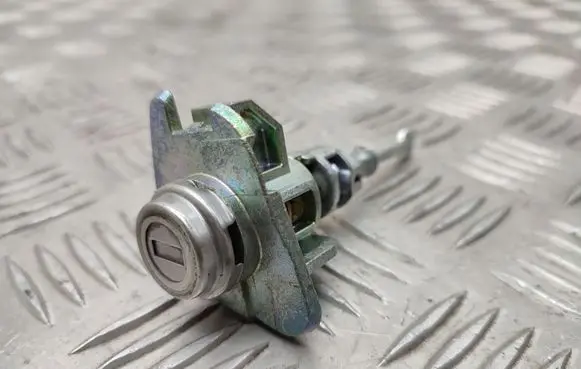 Hyundai Santa Fe Front door lock (next to the handle) 