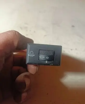 Headlight level height control switch