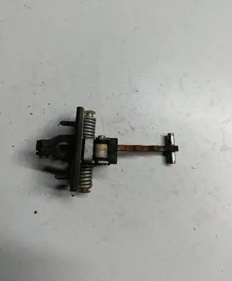 Front door check strap stopper