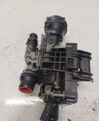Thermostat/thermostat housing