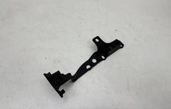 Volkswagen Touareg I Headlight/headlamp mounting bracket 7L0805734