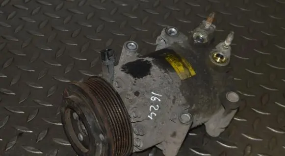 Ford Fiesta Air conditioning (A/C) compressor (pump) AV1119D629AB