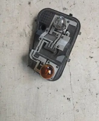 Volkswagen Touareg I Tail light bulb cover holder 7L6945258