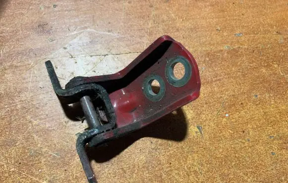Nissan Micra Rear door lower hinge