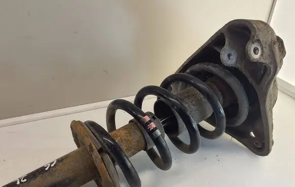 Front shock absorber with coil spring
