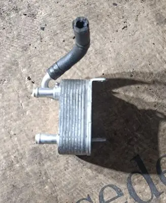 Volkswagen Touareg I Fuel cooler (radiator) 7L6203491D