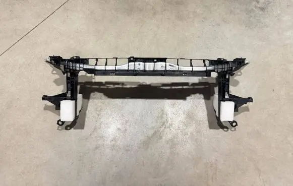 Top upper radiator support slam panel