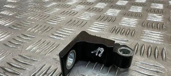 Rear door upper hinge