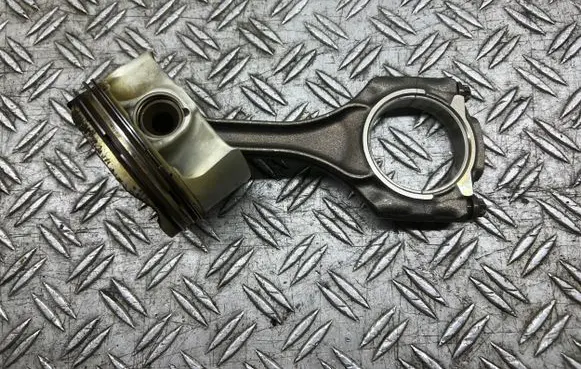 Piston with connecting rod