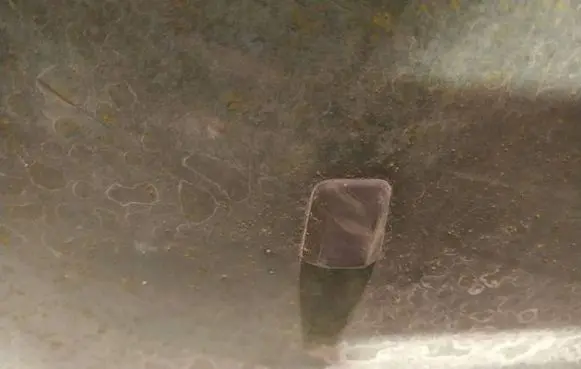 Windshield washer spray nozzle