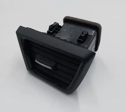 Nissan Leaf II (ZE1) Dash center air vent grill 687615SA0B