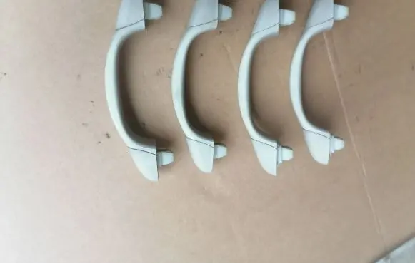 Saab 9-3 Ver2 A set of handles for the ceiling 