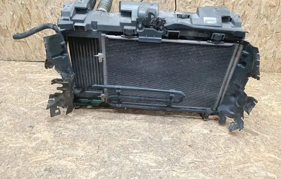 Radiator support slam panel