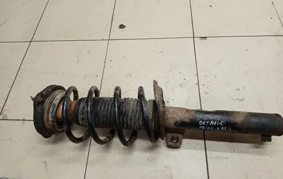 Skoda Octavia Mk2 (1Z) Front shock absorber with coil spring