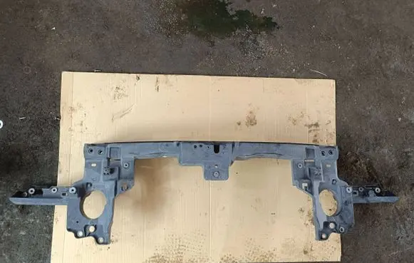Radiator support slam panel bracket