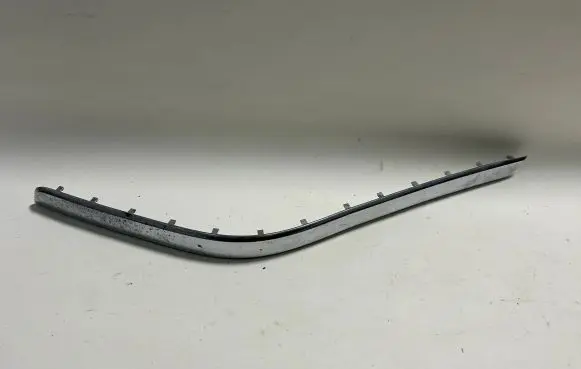 Rear bumper trim bar molding