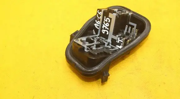 Tail light bulb cover holder