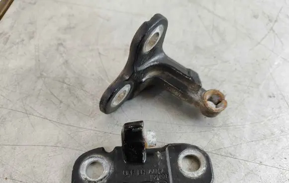 Rear door upper hinge