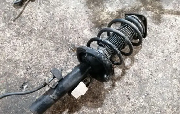 Front shock absorber with coil spring