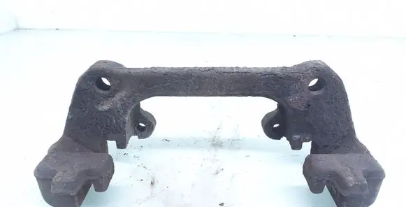 Volvo S60 Front Brake Caliper Pad/Carrier 