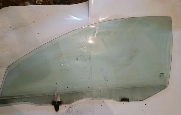 Nissan Primera Front door window glass four-door E643R00049