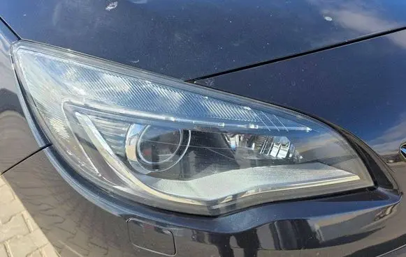 Opel Astra J Headlight/headlamp 