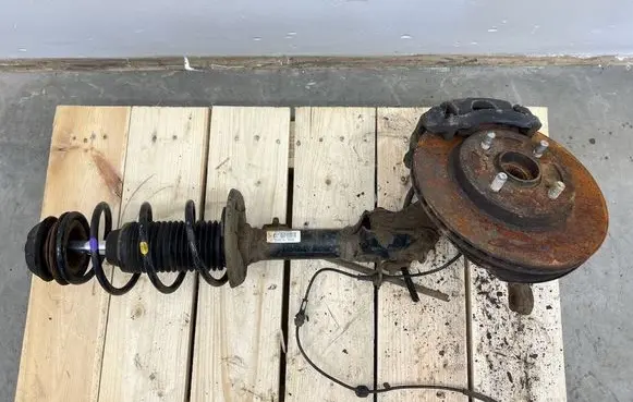 Suzuki Swift III Front shock absorber with coil spring 4160153R00