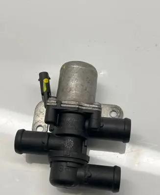 Coolant heater control valve