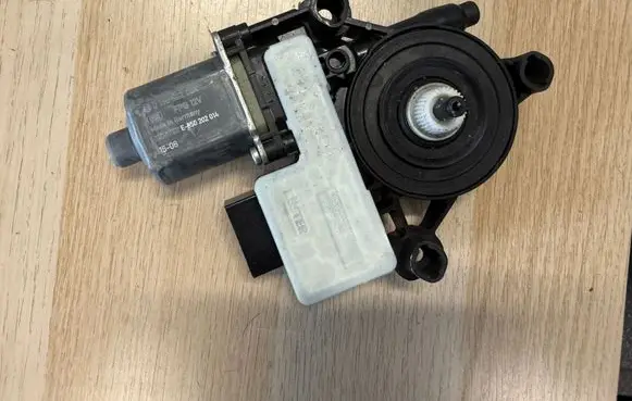 Rear door window regulator motor