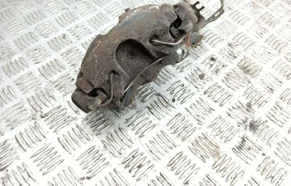 Opel Astra G Front brake caliper 