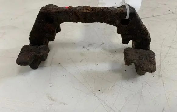 Saab 9-3 Ver1 Brake caliper pad carrier rear 1012