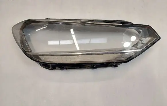 Volkswagen Touran II Headlight lense 1403000060