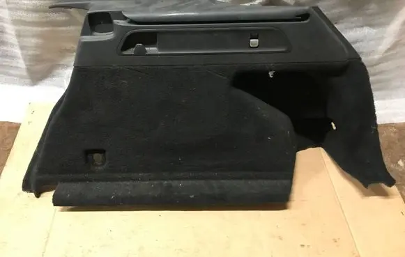 Trunk/boot lower side trim panel