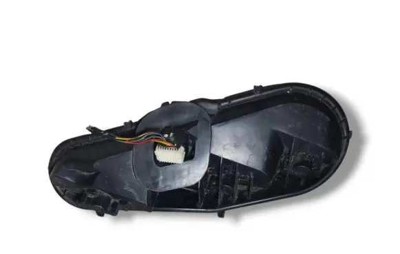 Tail light bulb cover holder