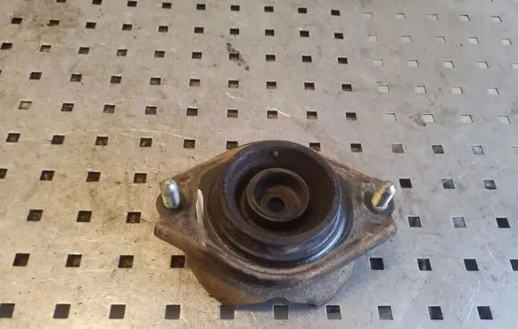 Subaru Outback Front shock absorber mounting bracket 