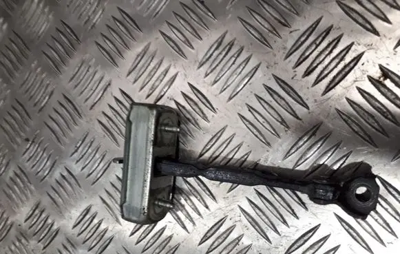 Front door check strap stopper