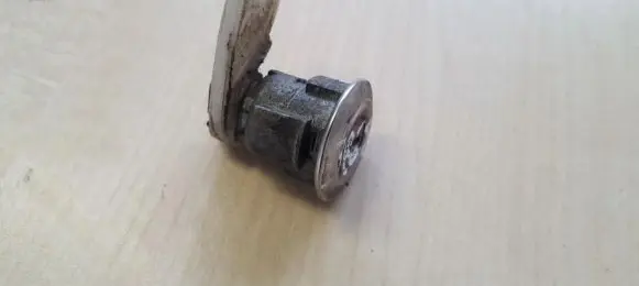 Ford Windstar Front door lock (next to the handle) 