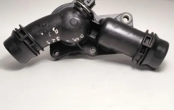 Thermostat/thermostat housing