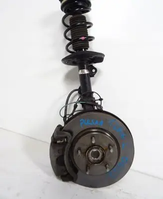 Nissan Pulsar Front shock absorber with coil spring 400013ZL0B