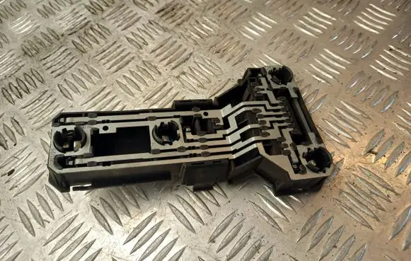 Tail light bulb cover holder