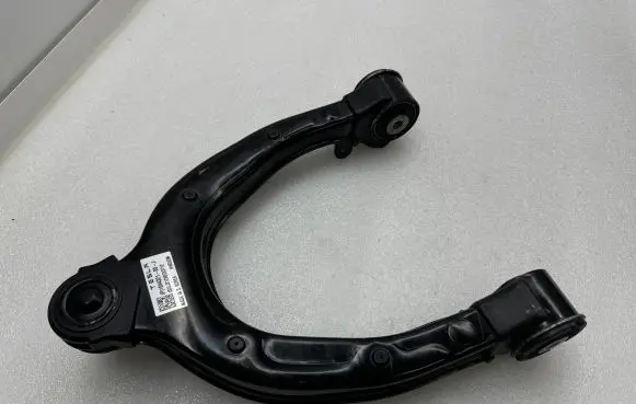 Tesla Model 3 Front upper control arm/wishbone 104432100J 21288C03712