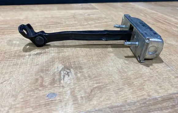 Rear door check strap stopper
