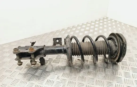 Front shock absorber with coil spring