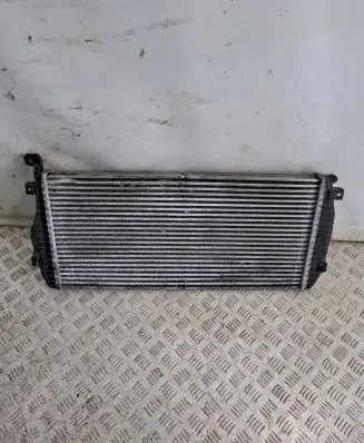 KIA Carens II Intercooler radiator 2827127450