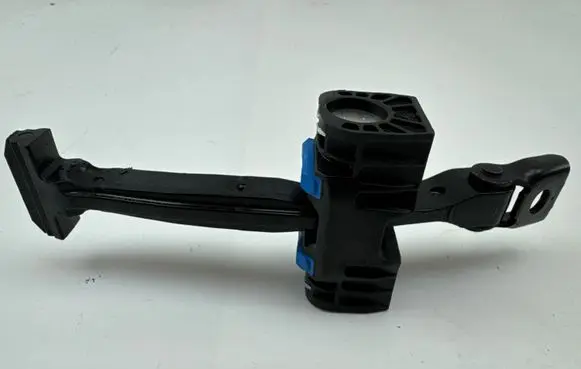 Front door check strap stopper