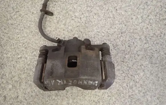 Suzuki Liana Front brake caliper